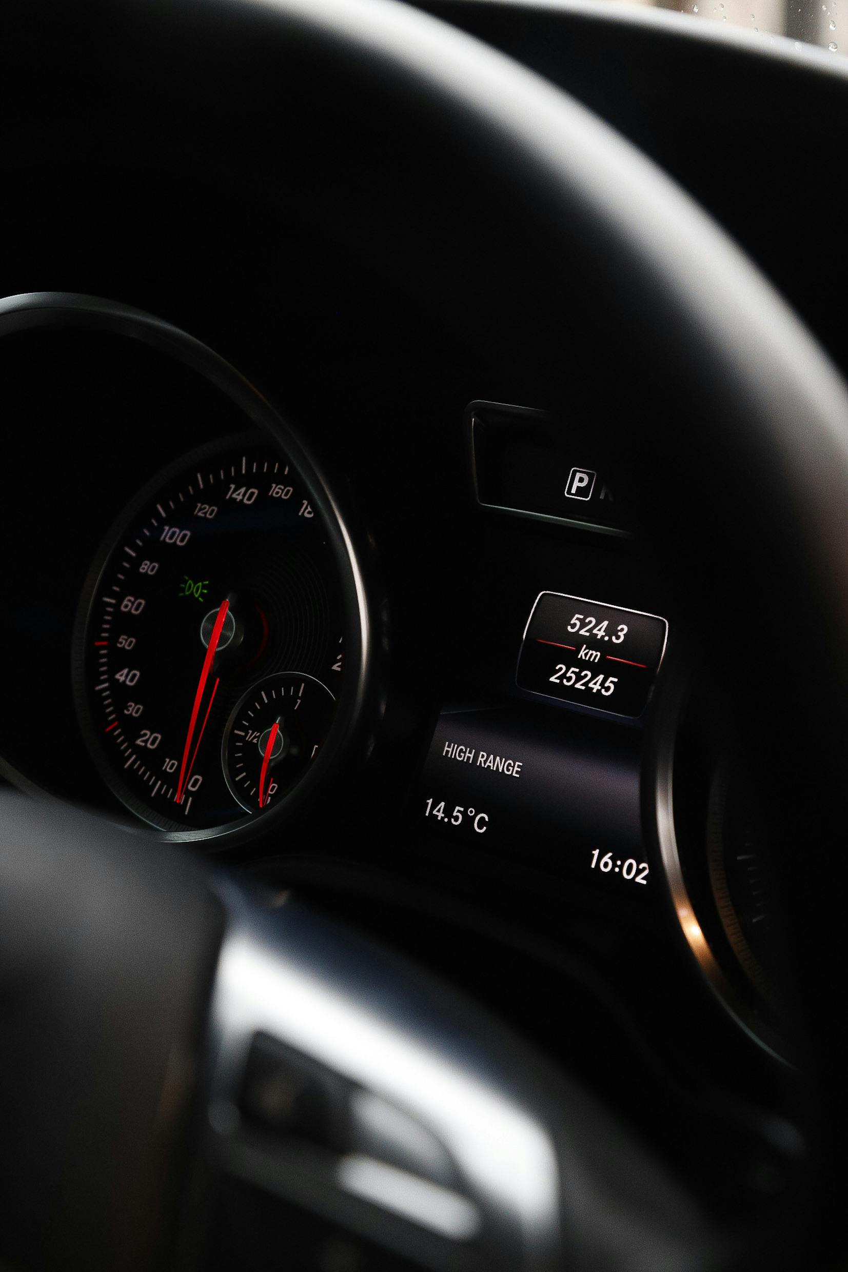 Car instrument cluster showing the speedometer and trip mileage readout